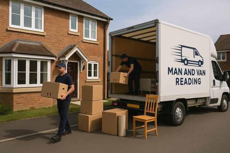 Man and Van Reading team moving a 2-bedroom house — professional movers loading boxes and furniture into a white van in Reading.